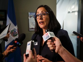 Edmonton Chamber of Commerce president and CEO Janet Riopel speaks to the media after a meeting with Alberta Finance Minister Joe Ceci at the chamber in Edmonton, Alta., on Monday August 10, 2015. Ian Kucerak/Edmonton Sun