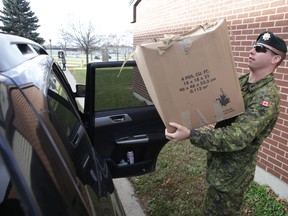 Sgt. Matt MacIsaac clears out his belongings from one of the residences on CFB Kingston on Monday, Nov. 23, 2015.
More than 480 military members are being relocated on the base this week in preparation for the possible arrival of as many as 600 refugees from Syria.
Elliot Ferguson/The Whig-Standard