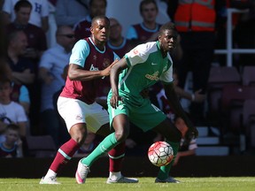 Werder Bremen's Ousman Manneh in action with West Ham's Doneil Henry in pre-season action earlier this year. (REUTERS)
