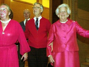 Fred Rogers (centre) is seen here in 2002 with Elsie Hillman (left), Henry Hillman (back) and former first lady Barbara Bush (right) at a Pittsburgh gala fundraiser. (AP Photo/Gene J. Puskar, File)
