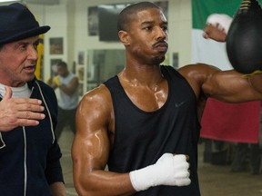 Michael B. Jordan, right, as Adonis Johnson and Sylvester Stallone as Rocky Balboa in a scene from Creed. (Barry Wetcher/Warner Bros.)