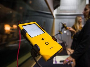 A PonoPlayer portable music player is displayed before a news conference in Vancouver, B.C., on Monday, Nov. 23, 2015 with Canadian musician Neil Young for the Canadian launch of his music player and PonoMusic music download service. THE CANADIAN PRESS/Darryl Dyck