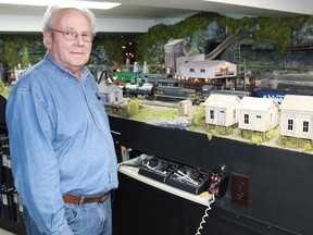 Don Eastman stands in front of his re-creation of the C & O Railway. The master model railway builder has been involved in the world of model building for 50 years. 
CARL HNATYSHYN/SARNIA THIS WEEK