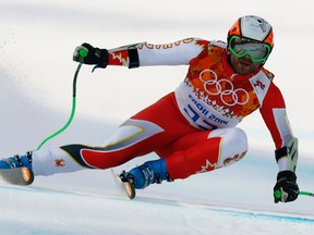 Canada's Jan Hudec skis during the men's alpine skiing Super-G competition at the 2014 Sochi Winter Olympics at the Rosa Khutor Alpine Center February 16, 2014.   REUTERS/Ruben Sprich