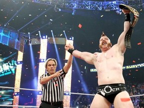 WWE superstar Sheamus celebrates after winning the WWE World Heavyweight Championship at Survivor Series on Sunday. (WWE.com)