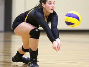 Cambrian Golden Shield women's volleyball team member Amanda Kring bumps the ball during OCAA women's volleyball action against Conestoga College in Sudbury, Ont. on Sunday November 22, 2015. Cambrian defeated Conestoga in 3 sets.