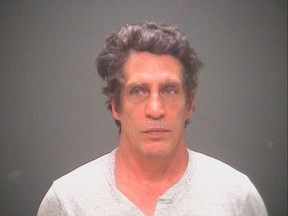 This undated photo provided by Cuyahoga County Prosecutor's Office shows Bobby Hernandez. Hernandez, accused of taking his 5-year-old son from the Alabama home of the boy's mother in 2002 and creating new identities for both of them was charged in Cleveland on Tuesday, Nov. 24, 2015, with kidnapping and forgery. (Cuyahoga County Prosecutor's Office via AP)