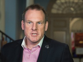Andrew Younger, the former Nova Scotia environment minister expelled from the Liberal caucus, talks with reporters at the legislature in Halifax on Tuesday, Nov. 24, 2015. Younger has filed a complaint with the privacy commissioner related to his personal health information being released by the premier's chief of staff. THE CANADIAN PRESS/Andrew Vaughan