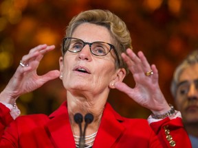 Premier Kathleen Wynne is pictured Tuesday when she made her latest announcement about climate change. (ERNEST DOROSZUK, Toronto Sun)