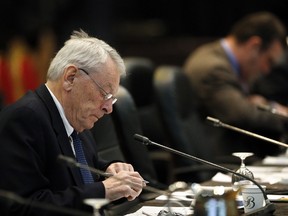 Dick Pound, the author of the report that detailed anti-doping corruption in Russia, prepares during a break in a meeting of the World Anti-Doping Agency in Colorado Springs, Colo., on Nov. 18, 2015. (Brennan Linsley/AP Photo)