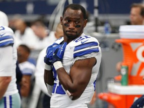 In this Sept. 27, 2015, file photo, Dallas Cowboys' Joseph Randle stands in the team bench area during an NFL football game against the Atlanta Falcons, in Arlington, Texas.  (AP Photo/Brandon Wade, File)