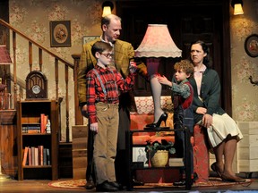 Matthew Olver (back left), Callum Thompson (front left), Sarah Machin Gale (back right) and Isaak Bailey (front right) rehearse a scene from A Christmas Story at The Grand Theatre in London Ont. November 24, 2015. 
CHRIS MONTANINI\LONDONER\POSTMEDIA NETWORK