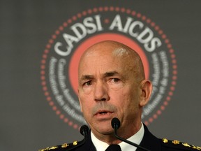 RCMP Commissioner Bob Paulson delivers a speech at a security conference put on by the Canadian Association of Defence and Security Industries (CADSI) in Ottawa on Wednesday, Nov. 25, 2015. THE CANADIAN PRESS/Sean Kilpatrick