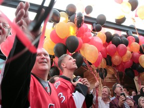 The Ottawa Sens House Sports Bar and Grill opened in mid- 2014. Bar owner Steve Monuk and Senator Marc Methot release some balloons during the opening.  Tony Caldwell/Ottawa Sun/QMI Agency