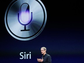 CEO Tim Cook talks about Siri during an Apple event in San Francisco, Calif., March 7, 2012.  REUTERS/Robert Galbraith