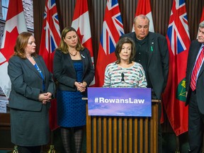 Kathleen and Gord Stringer, parents of Rowan Stringer, address the media at the media studio in Queen's Park in Toronto on Wednesday November 25, 2015 with PC MPP Lisa MacLeod (left), Liberal MPP John Fraser (right) and NDP MPP Catherine Fife (second from left). (Ernest Doroszuk/Toronto Sun)