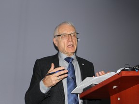 Dr. Morton Beiser, a professor of distinction in psychology at Ryerson University and the founding director and senior scientist of the Toronto Centre of Excellence for Research on Immigration and Settlement, speaks at CHEO's fourth annual global health half-day about mental health and refugee children Wednesday. (Julienne Bay/Ottawa Sun)