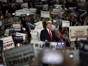 U.S. Republican presidential candidate Donald Trump speaks to supporters at an event at the Myrtle Beach Convention Center in Myrtle Beach, South Carolina, November 24, 2015. REUTERS/Randall Hill