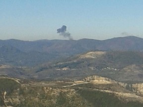 Some rises over a mountainous area in northern Syria after a war plane was shot down by Turkish fighter jets near the Turkish-Syrian border November 24, 2015. Turkish fighter jets shot down a Russian-made warplane near the Syrian border on Tuesday after repeatedly warning it over air space violations, Turkish officials said, but Moscow said it could prove the jet had not left Syrian air space. Turkish presidential sources said the warplane was a Russian-made SU-24. The Turkish military, which did not confirm the plane's origin, said it had been warned 10 times in the space of five minutes about violating Turkish airspace. Russia's defence ministry said one of its fighter jets had been downed in Syria, apparently after coming under fire from the ground, but said it could prove the plane was over Syria for the duration of its flight, Interfax news agency reported. REUTERS/Sadettin Molla