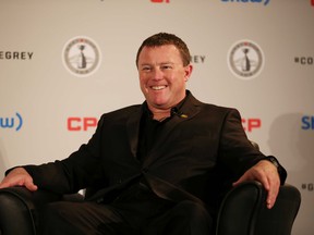 Eskimos head coach Chris Jones smiles during the coaches news conference during Grey Cup week in Winnipeg on Wednesday, Nov. 25, 2015. (Al Charest/Calgary Sun/Postmedia Network)