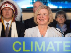 Premier Rachel Notley unveils Alberta's climate strategy in Edmonton, Alberta, on Sunday, November 22, 2015. The new plan will include carbon tax and a cap on oilseeds emissions among other strategies. THE CANADIAN PRESS/Amber Bracken