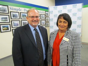 Mark Rodgers, CEO of Habitat for Humanity Canada, and Lambton Warden Bev MacDougall attend a celebration on Tuesday November 24, 2015 in Sarnia, Ont., of county-supported pilot projects with Habitat for Humanity Sarnia-Lambton. (Paul Morden, The Observer)
