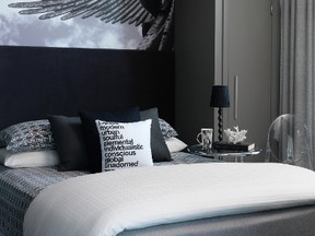 Black and white together are a classic combination and it suits the bedroom well.