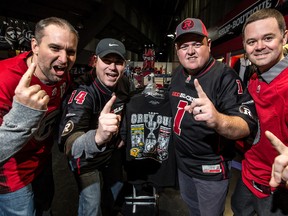 (L-R) Ben Patrick, Troy Carkner, Dave Desnoyers, and Spencer Callaghan are all rabid RedBlacks fans that were all born in and around the time when an Ottawa football team last won the Grey Cup. Wednesday November 25, 2015. Errol McGihon/Ottawa Sun/Postmedia Network