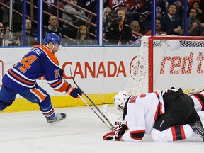 Jordan Eberle scores on a scramble around the net during the Nov. 20 game against the New Jersey Devils at Rexall Place. (USA TODAY SPORTS)