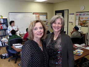 Robyn German, program manger at Language Instruction for Newcomers to Canada (LINC), and Donna Perrin, executive director of Kingston Literacy and Skills in a language class at their school on Bath Road on Thursday. (Ian MacAlpine/The Whig-Standard)