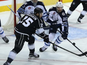 Defenceman Jay Harrison (right) will return to the lineup after missing seven games.