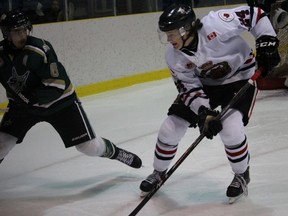 From left, St. Thomas Stars defenceman Carson Moniz and Sarnia Legionnaires winger Brock Perry brace for a collision during the Greater Ontario Junior Hockey League game at Sarnia Arena Thursday night. Perry scored his fifth goal of the season but his club lost 6-2. Terry Bridge/Sarnia Observer/Postmedia Network