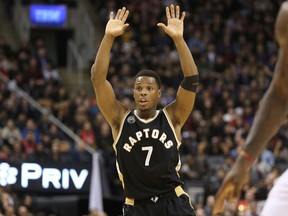 Toronto Raptors point guard Kyle Lowry reacts against the Cleveland Cavaliers at Air Canada Centre. The Raptors beat the Cavaliers 103-99. (Tom Szczerbowski/USA TODAY Sports)