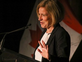 Alberta Premier Rachel Notley speaks to a crowd of supporters at Stampede Park in Calgary, Ab., on Thursday November 26, 2015. Mike Drew/Calgary Sun/Postmedia Network