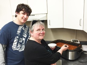 Bryan MacNeil and Rita Bailey, jobseekers from jobStart, serve chili at Wawanosh Enterprise during the annual chili lunches that take place at all Community Living Sarnia-Lambton locations. Community Living currently receives $45,000 annually for the Transitions program that helps clients adjust from school graduation to work life, or go to post-secondary school, and for some individuals, from living at home to independent living facilities. HANDOUT/ SARNIA OBSERVER/ POSTMEDIA NETWORK