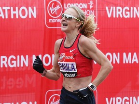 Paula Radcliffe runs during the Virgin Money London Marathon earlier this year. (Reuters/Suzanne Plunkett)