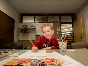 Cuyler May, 7, draws his favourite Pokemon, Pikachu, at the Pokemon Club in the Spruce Grove Public Library on Thursday, Nov. 19. This is May’s first time at the club, and told his mom that he needed to stay for the entire one and a half hours - Yasmin Mayne.
