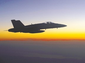 Prime Minister Justin Trudeau has good reason to stand firm on his decision to pull Canada?s six CF-18s, like this one, above, from the U.S.-led air campaign against Islamic State, says columnist R. Michael Warren. (Department of National Defence)