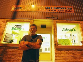 The owner of Johnny's Sub and Sandwich Café, John Hunt stands on Main Street in Seaforth. According to the police the alleged thief is in custody and had help from a female assailant.(Shaun Gregory/Huron Expositor0