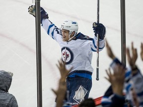 Nov 27, 2015; Saint Paul, MN, USA; Winnipeg Jets forward Nikolaj Ehlers (27) celebrates his goal during the third period against the Minnesota Wild at Xcel Energy Center. The Jets defeated the Wild 3-1. Mandatory Credit: Brace Hemmelgarn-USA TODAY Sports