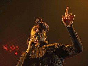 The Weeknd performs on The Madness Tour at MTS Centre on Fri., Nov. 27, 2015. Kevin King/Winnipeg Sun/Postmedia Network