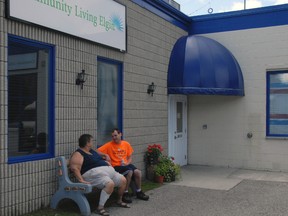 Twenty-nine clients of the Community Living Elgin workshop will have to do without the day programming services offered at the Curtis St. facility beginning in September, victims of program cuts and full-time staff layoffs.