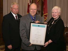 Supplied photo
Alfred Lafantaisie (centre) of Sudbury was recognized yesterday with the Ontario Senior Achievement Award, the highest provincial honour for seniors over 65. Elizabeth Dowdeswell, Lieutenant Governor of Ontario, and Mario Sergio, Minister Responsible for Seniors Affairs, presented the award.