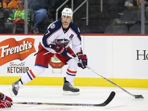 Blue Jackets forward Brandon Dubinsky was suspended one game by the NHL for cross-checking Penguins forward Sidney Crosby. (Elsa/Getty Images/AFP)