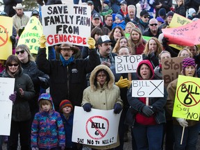 Farmers gather to protest Bill 6 at the Alberta Legislature, in Edmonton, Alta. on Friday Nov. 27, 2015. David Bloom/Edmonton Sun/Postmedia Network
