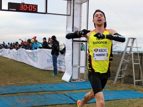 Ross Proudfoot, of the Speed River Track and Field Club, wins the senior men's Canadian Cross-Country Championships 10km race at Fort Henry in Kingston, Ont. on Saturday November 28, 2015. Steph Crosier/Kingston Whig-Standard/Postmedia Network