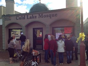 People gather in front of the Cold Lake Mosque after it was vandalized last October. File Photo REUTERS/Fraser Snowdon