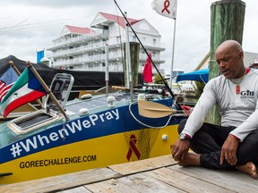 In this photo taken Sept. 21, 2015, Victor Mooney shares his story of rowing across the Atlantic Ocean while docked in Ocean City, Md. After three failed attempts, from Africa to New York City in memory of those who have died of AIDS. (Justin Odendhal/The Daily Times via AP)