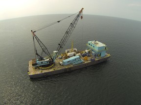 Offshore in Lake Erie, near Cleveland, a crane barge is captured in this drone image from September during work testing the lake bottom for soil stability needed for support bases for industrial wind turbines.
Special to Postmedia Network