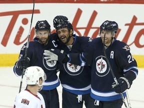 Andrew Ladd and Dustin Byfuglien want to remain with Winnipeg Jets